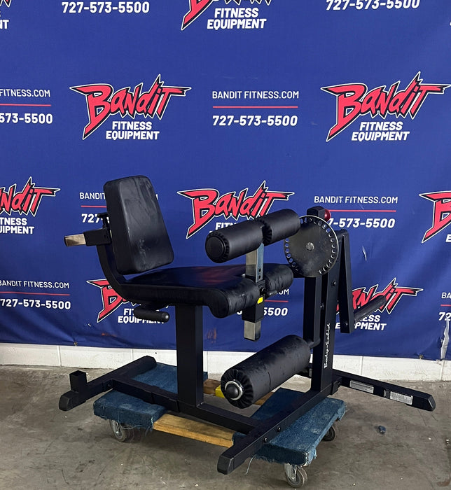 Used Body-Solid CAM Leg Extension & Curl Weight Plate Loaded